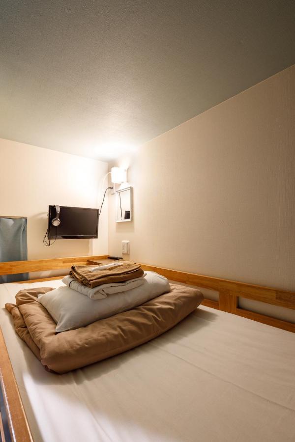 Owl Shinbashi Hôtel capsule